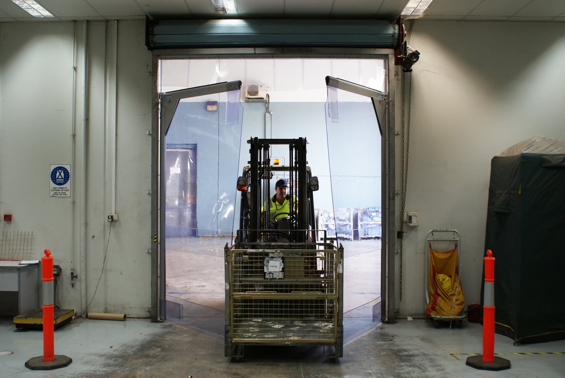 Coldshield_3000 Series_warehouseinstall.jpg Image of Door Swing Coldshield FlexiblePVC 3000Series Single