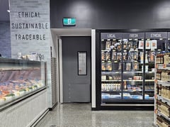 Coldshield_4500 Series_retailinstall.jpg Image of Door Swing Coldshield ThermalTraffic 4500Series Single