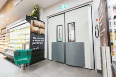 Coldshield_4500 Series_shopinstall.jpg Image of Door Swing Coldshield ThermalTraffic 4500Series Double Frame