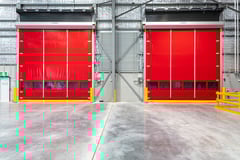 Coldshield_HS 65_warehouseinstall.jpg Image of Door Roller Coldshield Rapid HS65 ProtrudingTrack